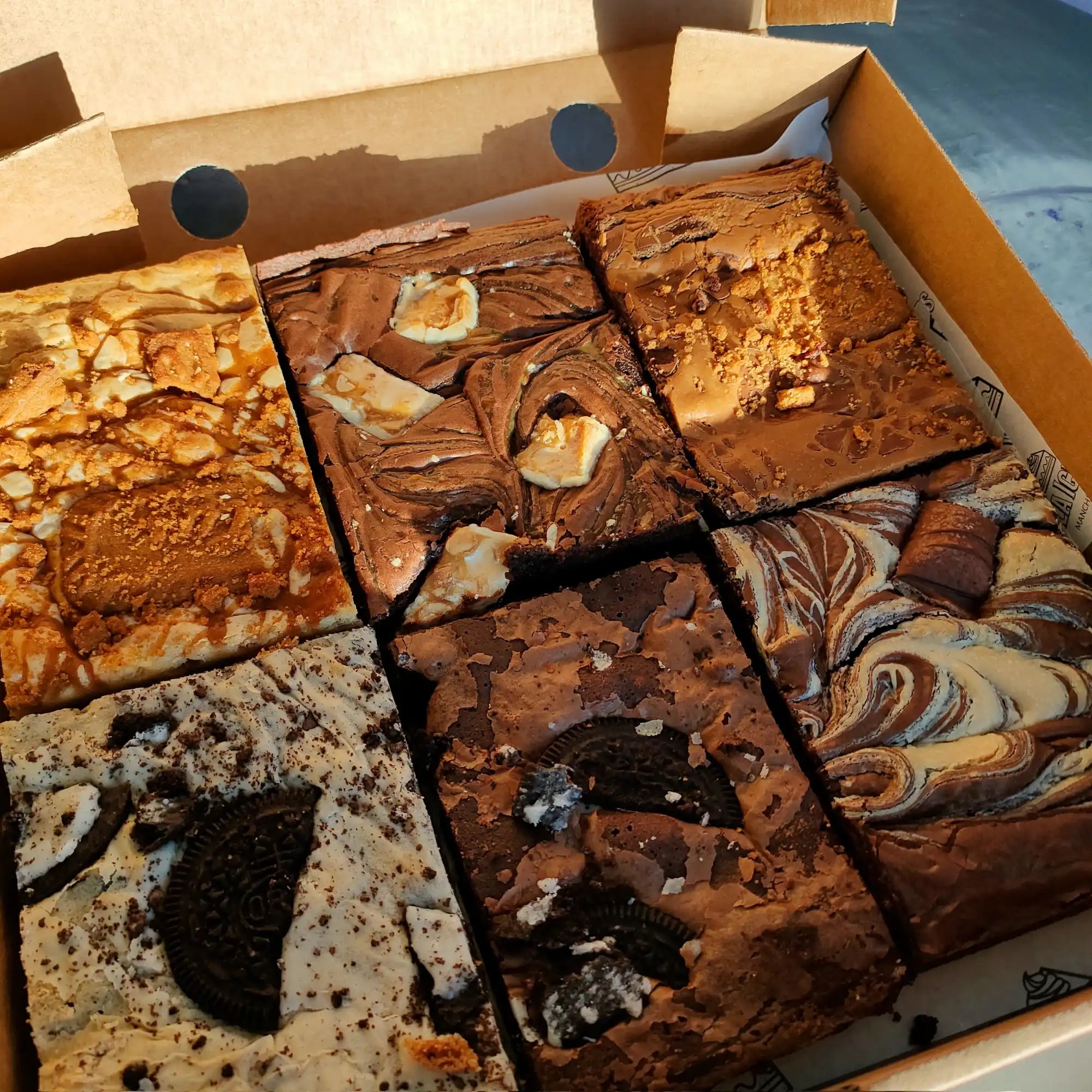 Box of assorted brownies.
