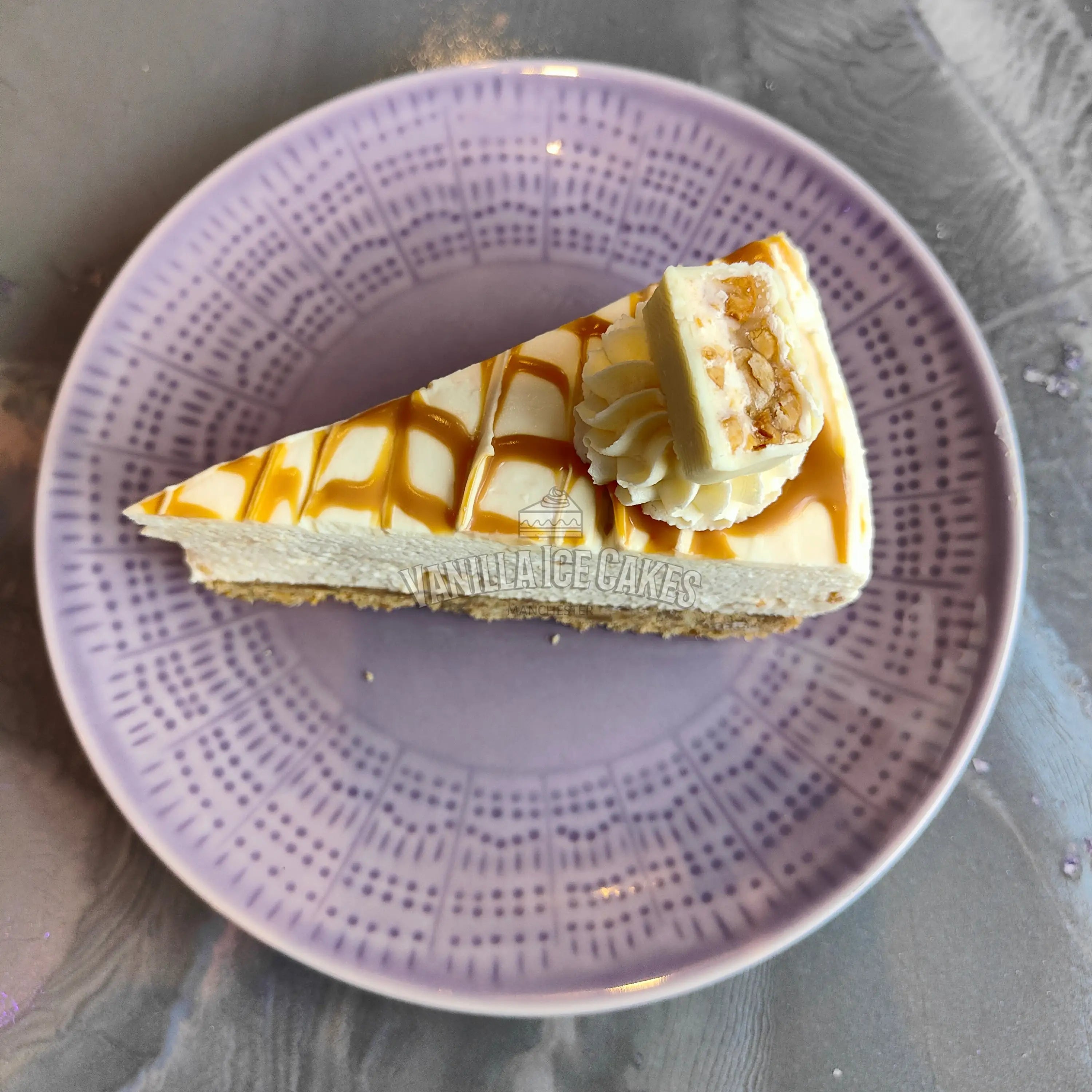 White Chocolate Snickers Cheesecake Slice